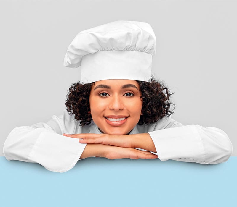 a child in a chef hat