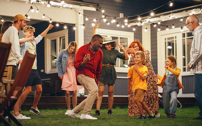 a group of people dancing outside