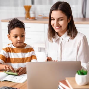 woman and boy at computer