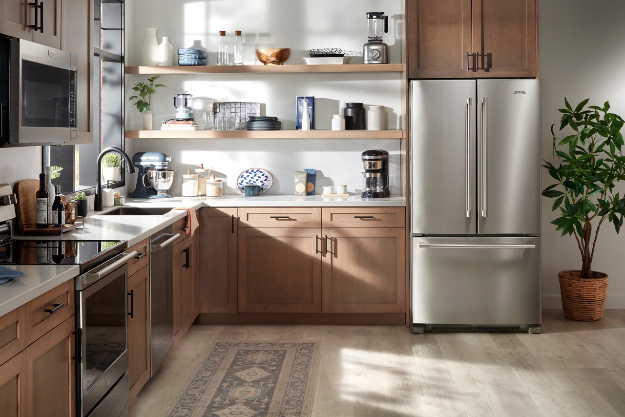 Kitchen with fridge and dishwasher in view