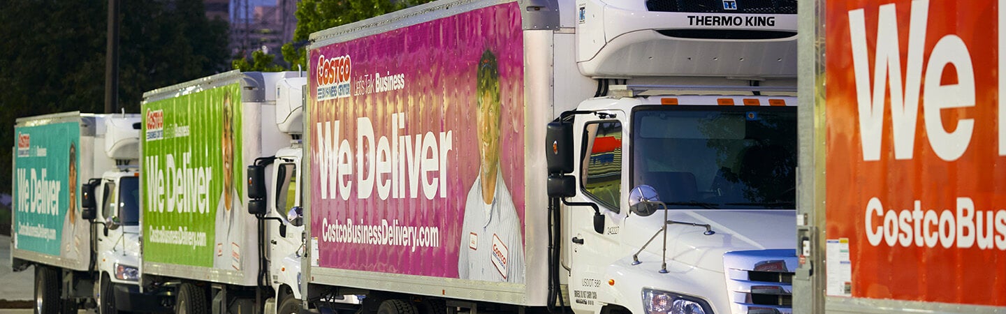 Line of Costco delivery trucks - transportation and logistics