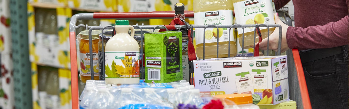 Costco cart filled with Kirkland Signature products