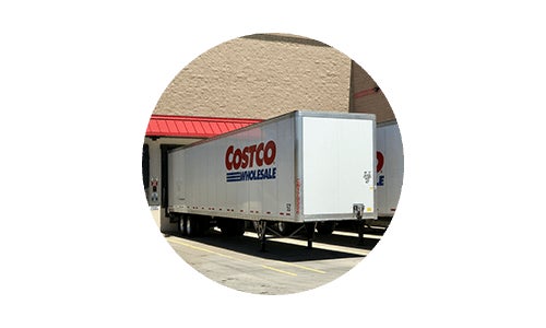 Costco delivery trailers parked at dock at depot