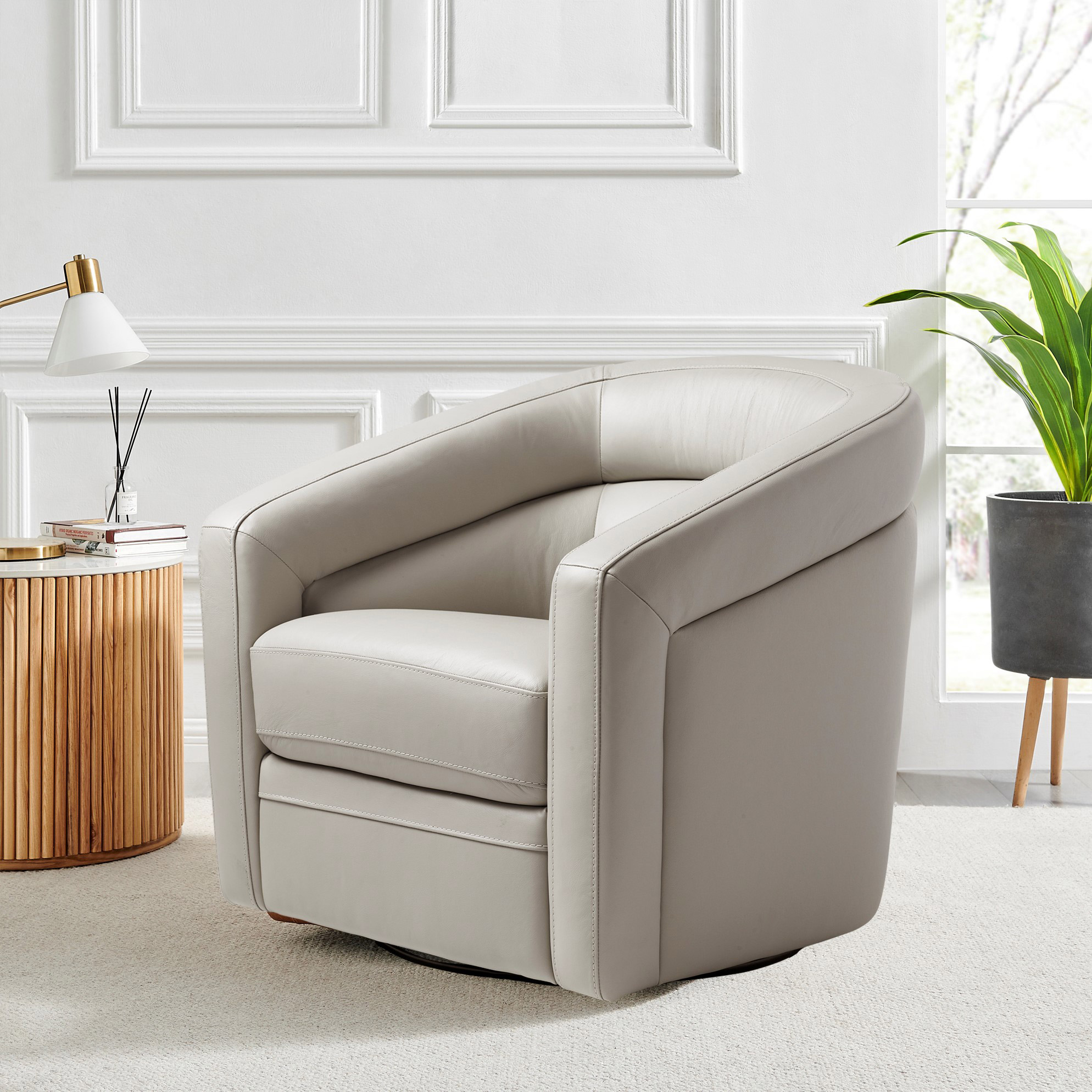 Paul - Fauteuil demi-tonneau pivotant en cuir fleur