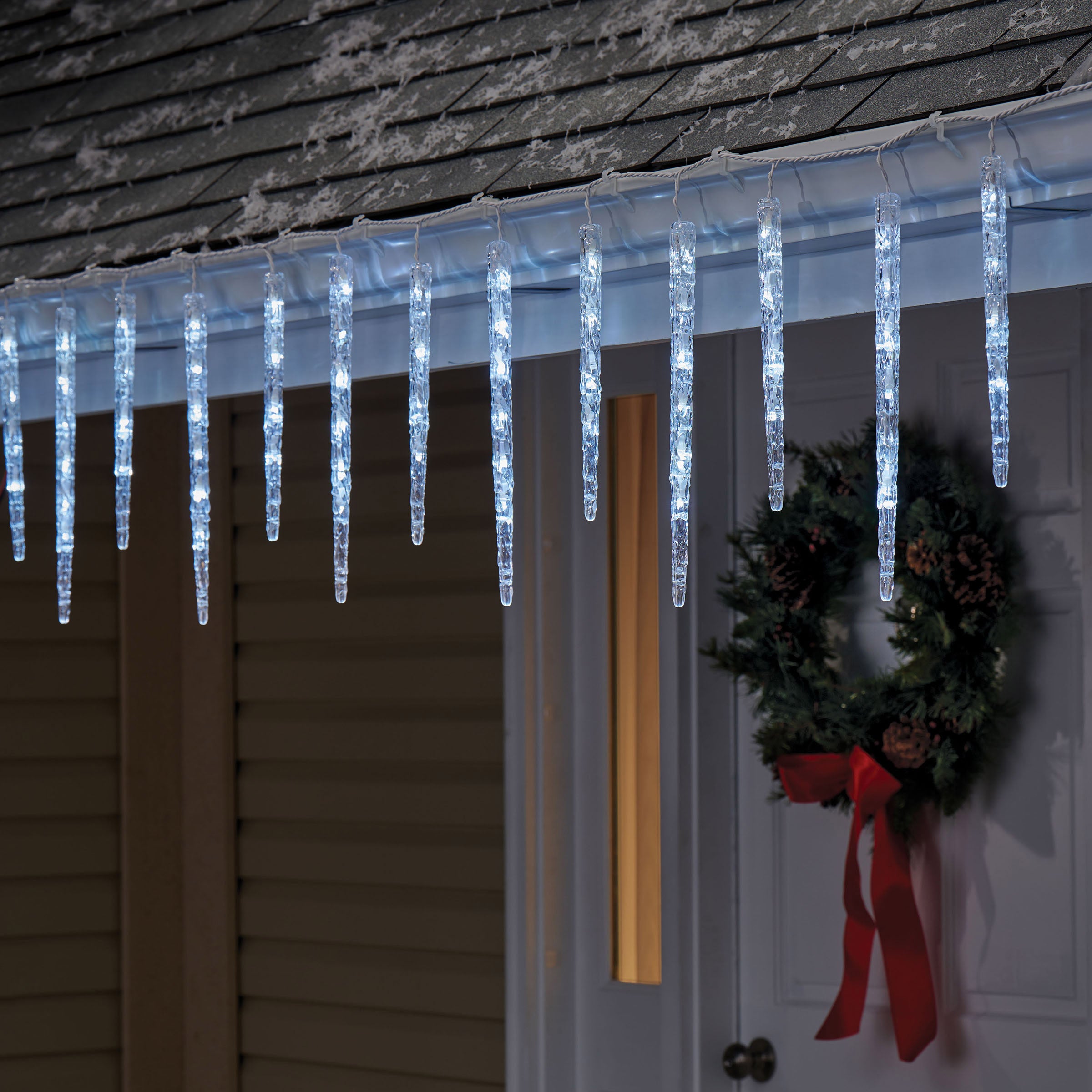 Sylvania 20 Twinkling Light Molded Pure White Icicles Set | Costco