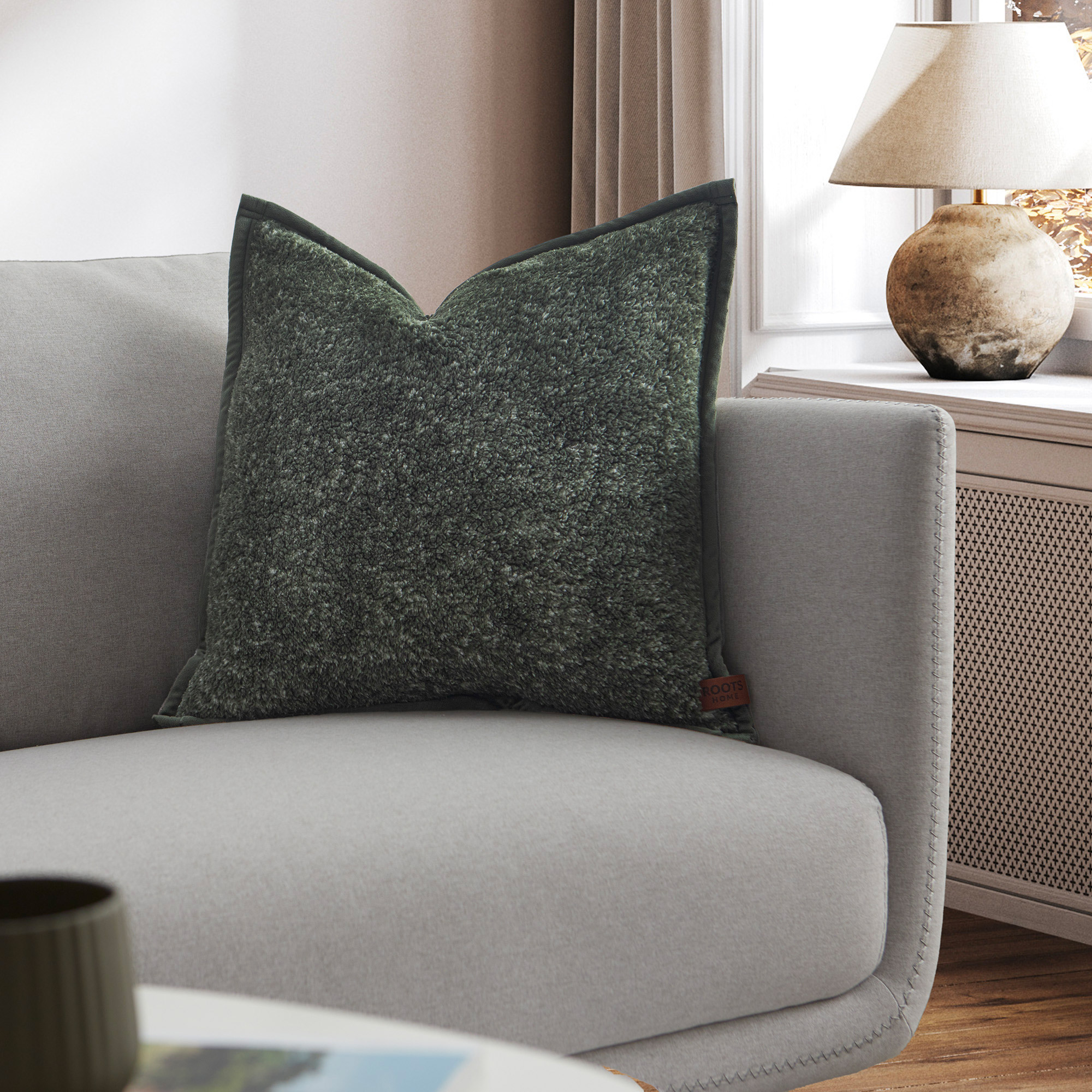 Roots Home Sherpa Decorative Cushion | Costco