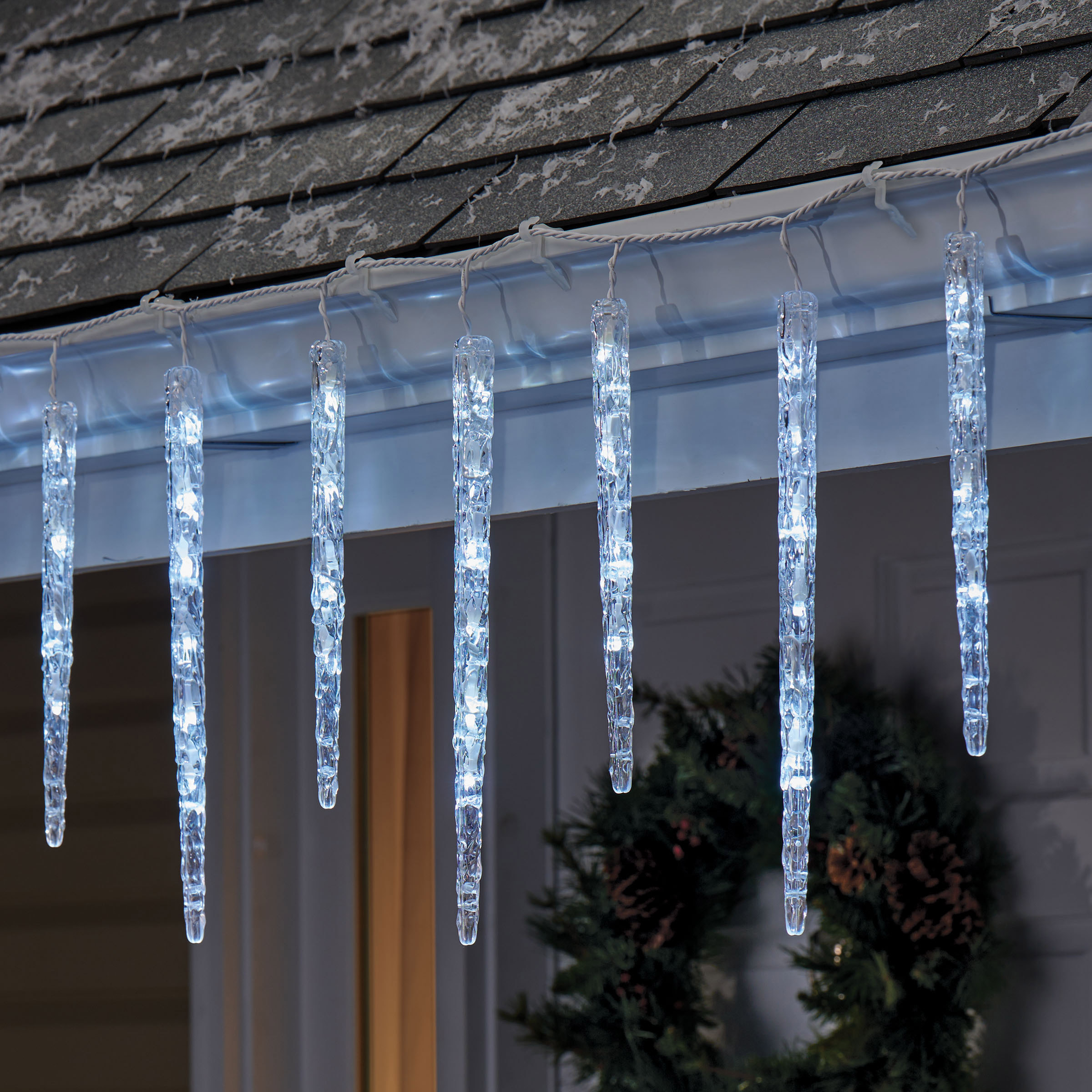 Sylvania 20 Twinkling Light Molded Pure White Icicles Set | Costco
