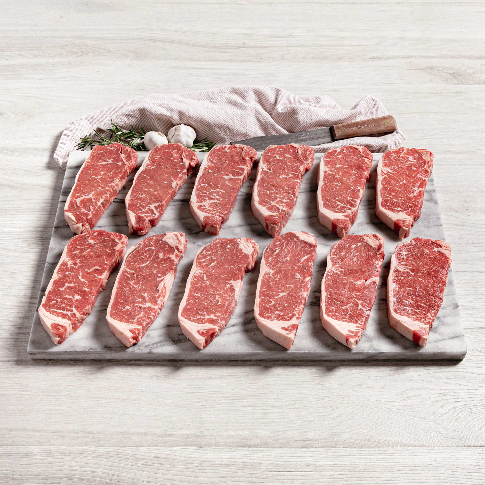 Rastelli’s USDA Choice Black Angus NY CC Strip Steak (12/10 Oz. Per Steak)  12 Total Count  7.5 Lbs. Total